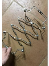 Found at a thrift store, this stainless steel accordion-like thing says “Made in Italy” and feels very durable. It compresses and extends