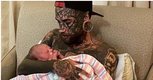 A 24-year-old father, who has several tattoos all over his body, makes the decision to get them erased for his child